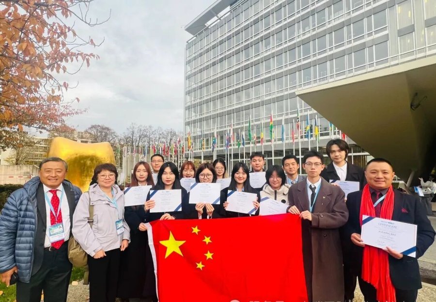 The Chinese joint delegation at WHO Headquarters, holding certificates signed by Dr. Tedros